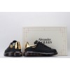 AMQ black oversized sneakers with gold heel