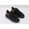 AMQ black oversized sneakers with gold heel