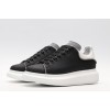 AMQ black oversized sneakers with siL*Ver heel