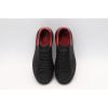 AMQ black oversized sneakers with red heel