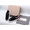 AMQ oversized black sneakers with rose heel