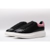 AMQ oversized black sneakers with rose heel